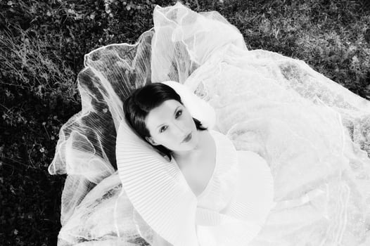 Beautiful bride outdoors in black and white photo