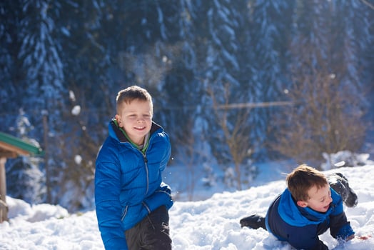 kids playing with  fresh snow photo