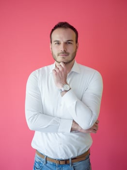 man isolated over a red background photo