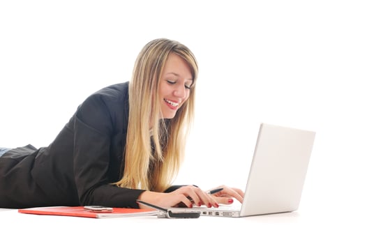 one young girl work on laptop isolated on white photo