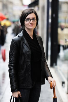 woman on street with umbrella photo