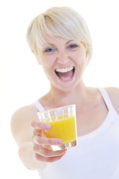 Young woman drinking orange juice isolated over white background photo