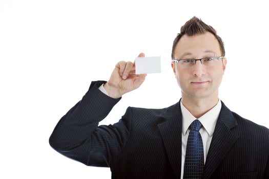 young businessman with empty white card photo