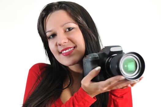 Young woman holding camera in hand taking picture isolated photo