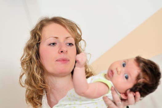 beautiful young mother small with little baby photo