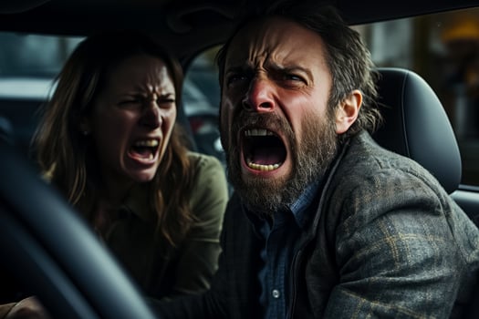 A furious man yells from his car while a woman reacts with wide-eyed frustration in a traffic jam photo