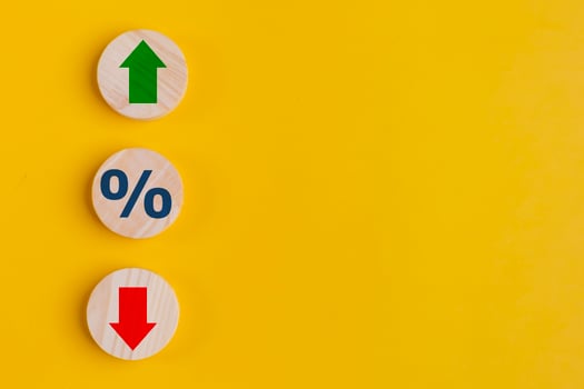 Cube block with percentage symbol icon. Interest rate financial and mortgage rates concept. Wood cube change arrow down to up. Interest rate, stocks, ranking. Business and finance concept. photo