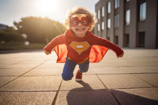 Happy child playing superhero at outdoors  ,Generative AI. photo