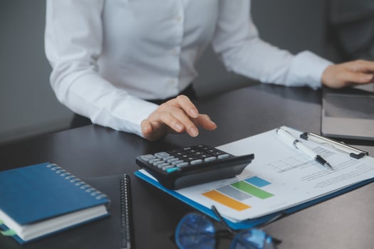 Entrepreneur Asian businessman and businesswoman discussing new business project in tablet in modern Meeting In Modern Office, Asian business casual concept. photo