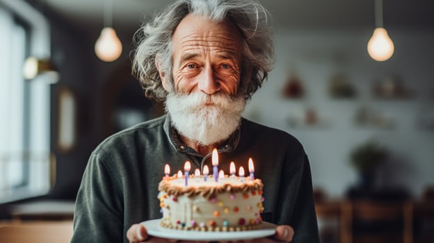 Old man with Birthday cake photo
