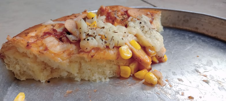 Corn pizza with cheese and sausage photo