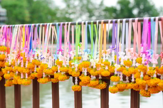 Garlands for worshiping Buddha are made from jasmine and marigold flowers. photo