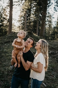Happy family with little son on a hiking trip in a forest, Schwaegalp, Nesslau, Switzerland photo