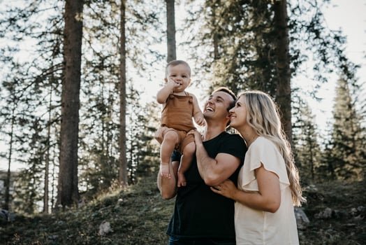 Happy family with little son on a hiking trip in a forest, Schwaegalp, Nesslau, Switzerland photo