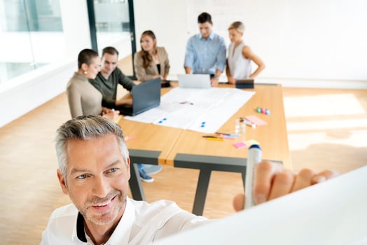 Business people having a workshop in office, discussing plans photo