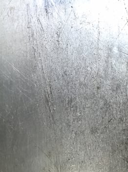 Metal texture with dust scratches and cracks. photo