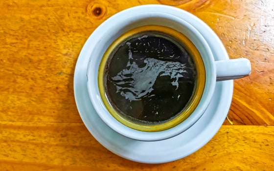 Cup of americano black coffee in restaurant cafe in Mexico. photo