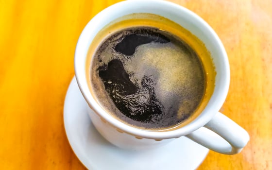 Cup of americano black coffee in restaurant cafe in Mexico. photo