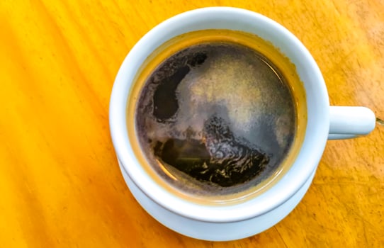 Cup of americano black coffee in restaurant cafe in Mexico. photo