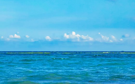 Tropical mexican beach clear turquoise water Playa del Carmen Mexico. photo