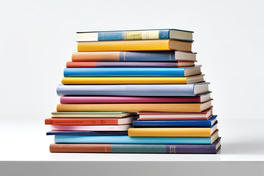 A book pile close up on a table. Front view pile book. For festival of world book day, national book day or national education day. Stack of colorful books on white background by AI Generated photo