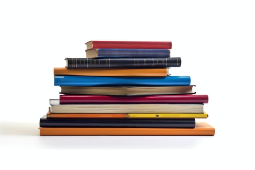 A book pile close up on a table. Front view pile book. For festival of world book day, national book day or national education day. Stack of colorful books on white background by AI Generated photo