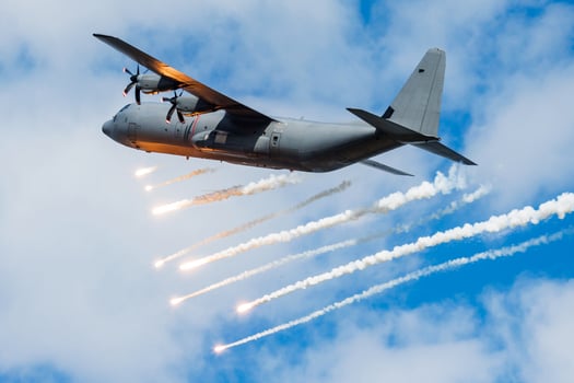 Untitled military transport plane at air base. Airport and airfield. Air force and army flight operation. Aviation and aircraft. Air lift. Military industry. Fly and flying. photo