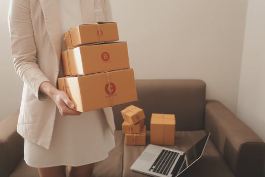 Business woman start up small business entrepreneur SME success .freelance woman working at home with Online Parcel delivery. SME and packaging deliveryconcept photo
