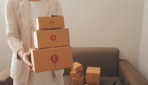 Business woman start up small business entrepreneur SME success .freelance woman working at home with Online Parcel delivery. SME and packaging deliveryconcept photo
