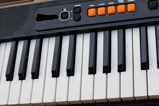 Close-up of piano keys. Piano black and white keys and Piano keyboard musical instrument placed at the home balcony during sunny day. photo