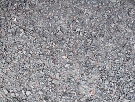asphalt rough and rocky grunge surface, texture background, gray paved road photo