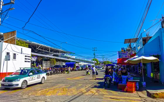 Puerto Escondido Oaxaca Mexico 2023 Typical beautiful colorful tourist street sidewalk city Puerto Escondido Mexico. photo