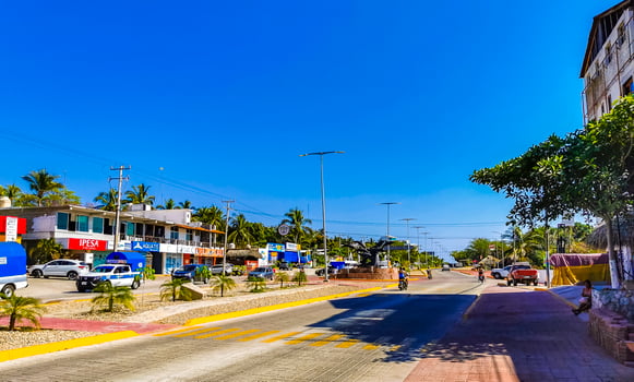 Puerto Escondido Oaxaca Mexico 2023 Typical beautiful colorful tourist street sidewalk city Puerto Escondido Mexico. photo