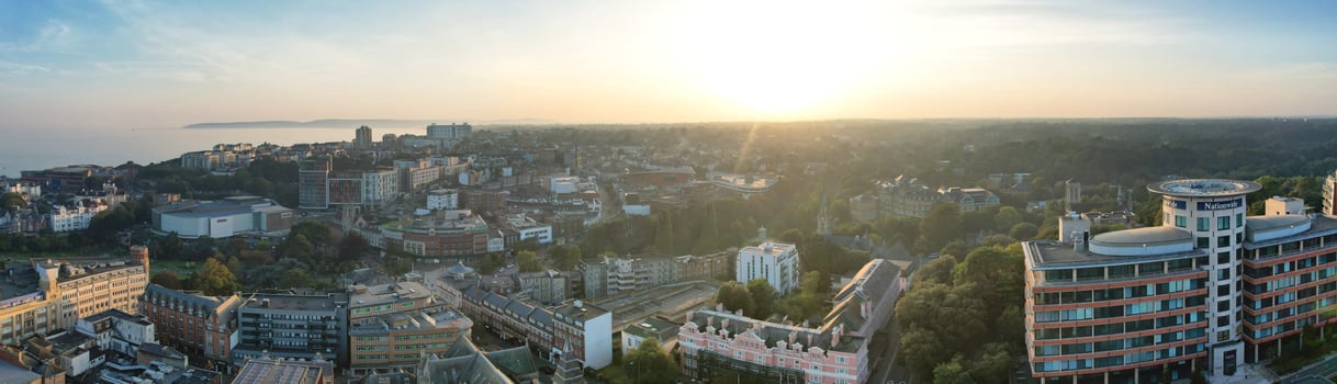 Aerial Panoramic View of British Tourist Attraction at Sea View of Bournemouth City of England Great Britain UK. High Angle Image Captured with Drone's Camera on September 9th, 2023 During Sunset photo