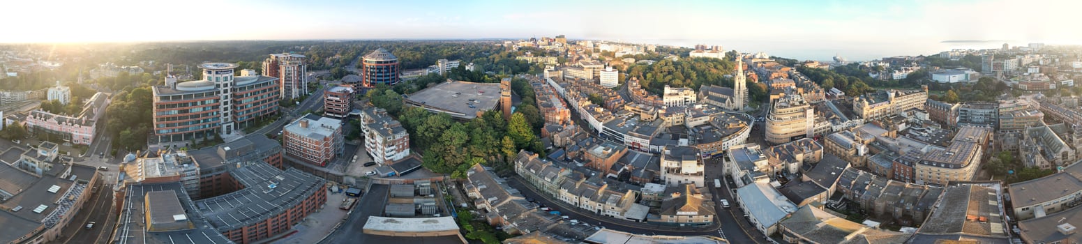 Aerial Panoramic View of British Tourist Attraction at Sea View of Bournemouth City of England Great Britain UK. High Angle Image Captured with Drone's Camera on September 9th, 2023 During Sunset photo