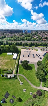 Aerial Vertical Panoramic View of North Luton City Residential Estate of England Great Britain UK. The High Angle Footage Was Captured with Drone's Camera on August 15th, 2023 photo