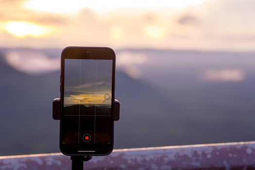 The phone is taking a video of the tourist attractions. photo