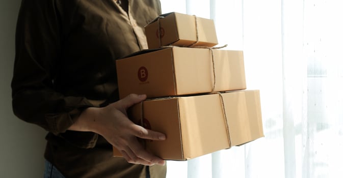 Business woman start up small business entrepreneur SME success .freelance woman working at home with Online Parcel delivery. SME and packaging deliveryconcept photo