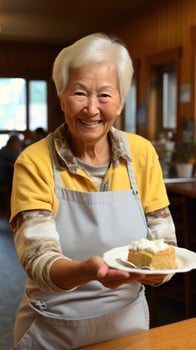 Woman serving a slice of pie photo