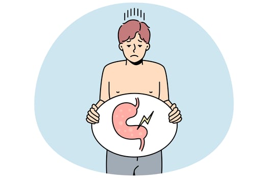 Sick man suffer from indigestion photo