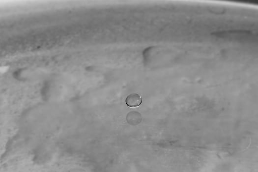 falling drops in water photo