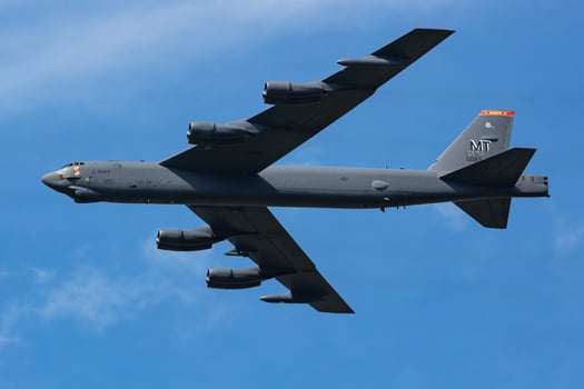 US Air Force Boeing B-52 Stratofortress strategic bomber plane at air base. Military aircraft. Aviation industry. Fly and flying. photo