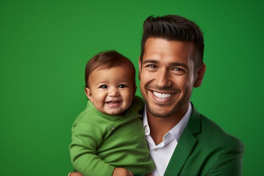 Ai generated studio portrait of handsome man holding infant baby in his hands on different colour background photo