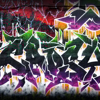 Colorful background of graffiti painting artwork with bright aerosol strips on metal wall photo