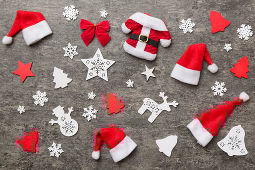 Christmas composition. Christmas hat pants Santa fur coat on color background. Flat lay, top view, copy space. Xmas postcard template photo