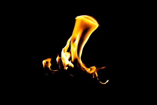 Fire flame texture. Burning material backdrop. Burn effect pattern. Blaze and torch wallpaper. Heat and haze backdrop. photo