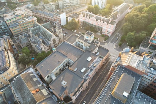 Aerial View of British Tourist Attraction of Bournemouth Beach and Sea view City of England Great Britain UK. Image Captured with Drone's Camera on September 9th, 2023 During Sunset photo