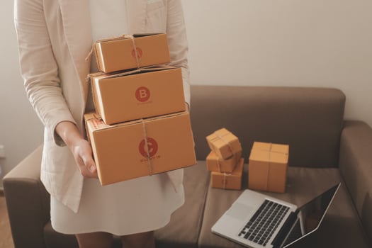 Business woman start up small business entrepreneur SME success .freelance woman working at home with Online Parcel delivery. SME and packaging deliveryconcept photo