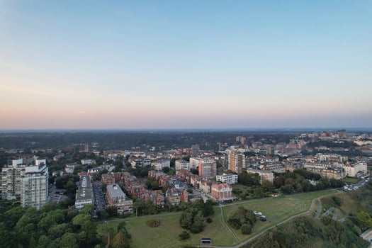Aerial View of British Tourist Attraction of Bournemouth Beach and Sea view City of England Great Britain UK. Image Captured with Drone's Camera on September 9th, 2023 During Sunset photo