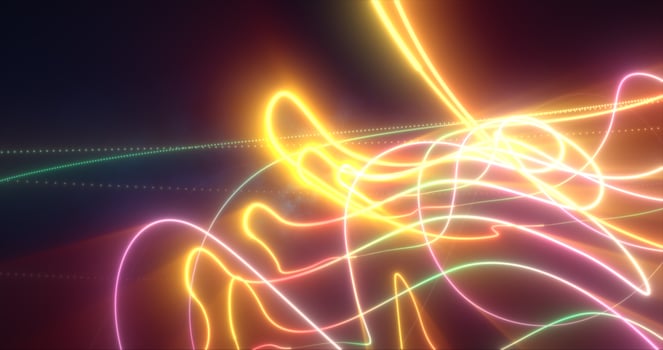 Abstract yellow glowing neon energy laser lines flying on a black background photo